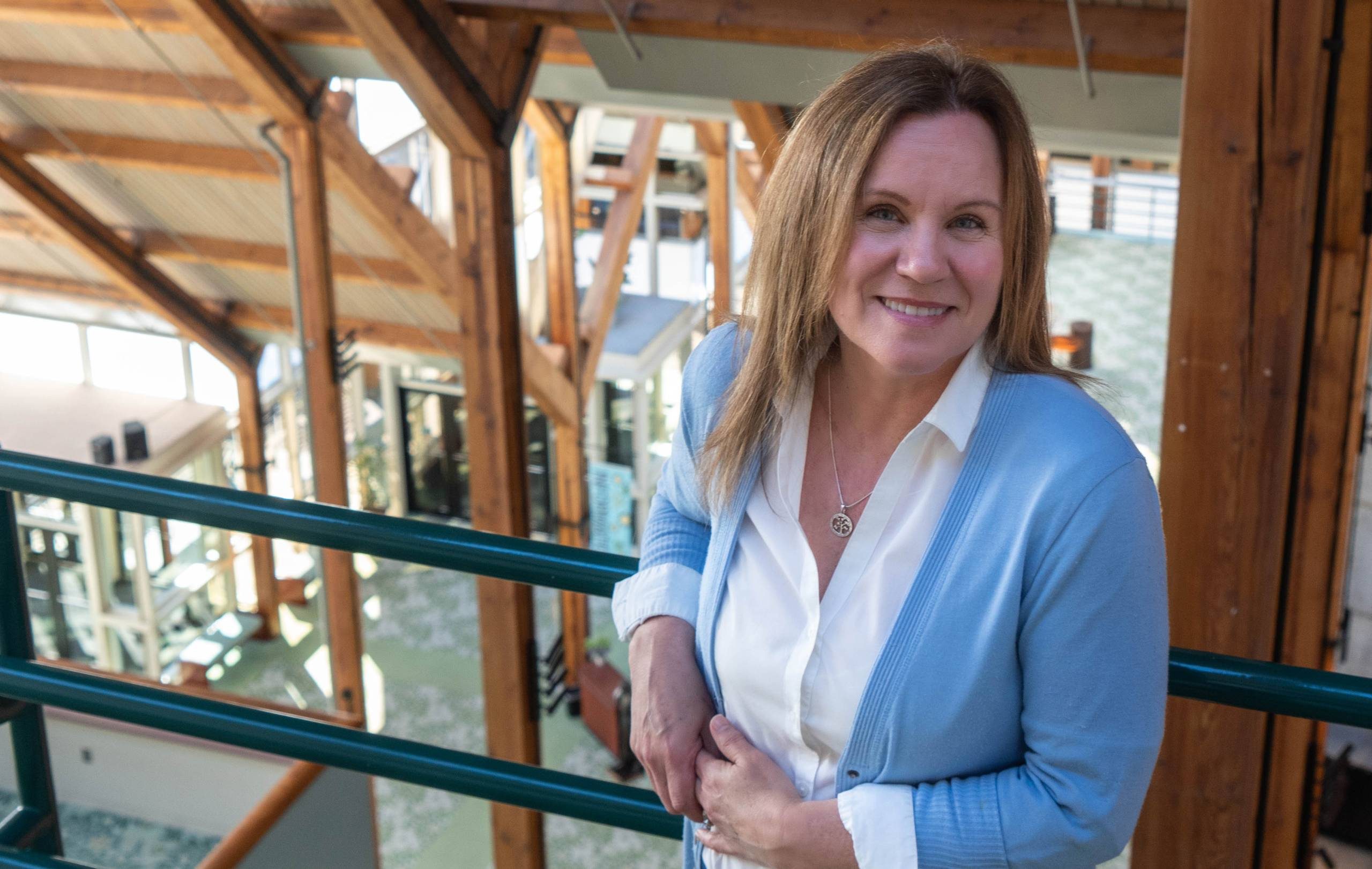 Image of Theresa Sizemore with the Hult Center lobby in background