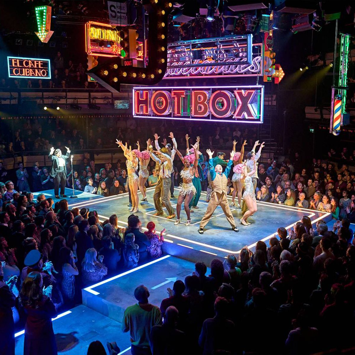 A picture image of performers on stage (guys dolls) for march 2023 notebook.